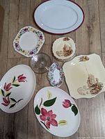 Group shot of all serving pieces laid out on floor