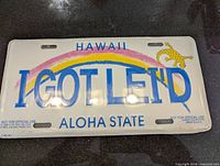 Front view of sealed Hawaii novelty license plate