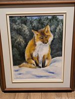 Full view of framed painting showing fox, snow and forest