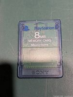 Front view of Sony PS2 8MB MagicGate memory card showing branding and capacity