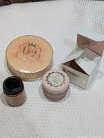 All three vintage cosmetic items together showing labels and packaging