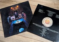 Front and back covers of Wings “Back to the Egg” LP with visible wear and handwriting
