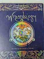 Front cover showing title, holographic medallion, ornate border