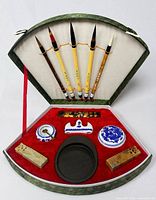 Entire open case showing all 12 pieces arranged