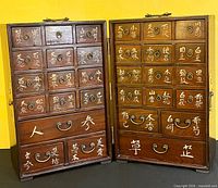 cabinet open showing drawers and characters