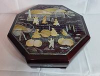lid view showing full mother-of-pearl inlay scene