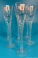 Front view of six Holmegaard crystal liqueur glasses