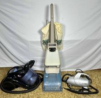 Group shot of Hoover carpet cleaner, Fantom vacuum, Euro-Pro steamer