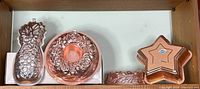 Pineapple, floral ring, nested star molds with small fluted ring