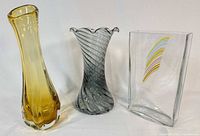 Front view of three vases showing color and shapes
