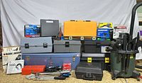 overall lot showing stacked toolboxes, level, Shop-Vac and boxed items