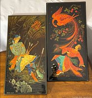 Both lacquer panels side by side on table
