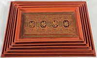 All six trays stacked showing nesting sizes and stepped rims