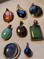 All eight pendants laid out for group view