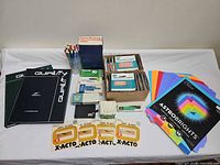 Full lot view showing cardstock, sketchbooks, markers, blade packs, staples, erasers