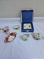 Group shot of all five china pieces