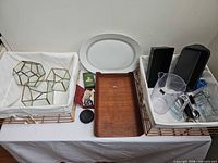 Overview of all items including baskets, terrariums, platter, bentwood tray, bakeware and utensils