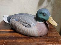 Side view of painted resin mallard decoy