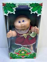 Front view of boxed Cabbage Patch Kids Holiday Baby doll