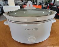 Front view showing Crock-Pot branding, exterior condition and control dial