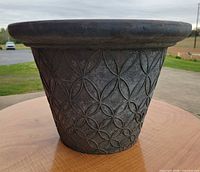 Exterior side view showing decorative pattern and overall shape