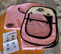 Playpen folded with carrier bag and instruction sheet