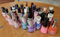 Front and angle view of grouped nail polish bottles