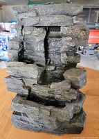 Front view of stacked-rock resin fountain