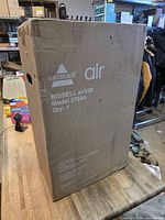 Sealed BISSELL air320 carton side view showing branding and model 2768A