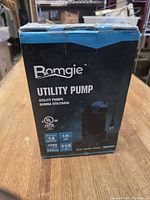Front of Bomgie pump box with model, HP, flow rate, voltage