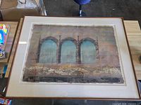Front view of framed artwork showing image, mat and frame