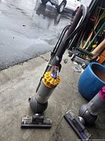Full view of Dyson DC40 Origin upright vacuum with floor head attached