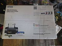 Front of Epson R280 printer box showing model and features