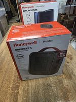 Front of boxed Honeywell UberHeat 5 heater