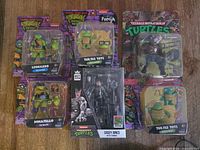 All six sealed TMNT action figure packages displayed together