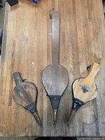 Front view of all three bellows showing sizes, wood, leather and nozzles