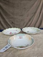 All three floral porcelain bowls overview