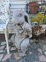 Front view of concrete rabbit statue