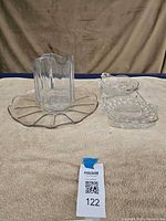 Group shot showing pitcher, platter and rectangular dish representing candy bowls