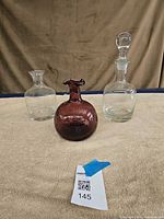 Front view of three glass pieces together