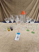 Full lot layout showing both shakers, wine, champagne, cordial and shot glasses