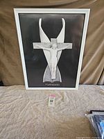 White-framed Pietrasanta crucifix photo print