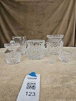 Front view of all six cut glass pieces