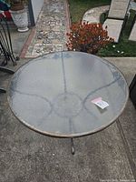 overhead view of round glass patio table