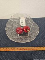 Plate with both apples, ruler for scale