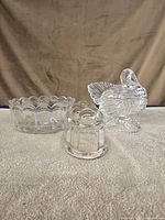 All three glass items: turkey covered dish, round scalloped bowl, cylindrical candy dish