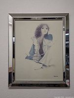Full view of framed print on wall