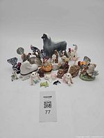 Group shot of entire lot displaying all miniature animal figurines