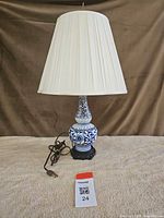 Full view of lamp with shade and cord