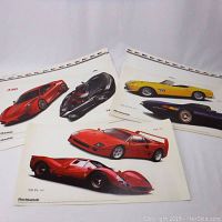 Four sheets of Blue Mountain Ferrari peelable car stickers showing Ferrari 430, black convertible Ferrari, yellow convertible Ferrari, and a purple Ferrari on white sheets.